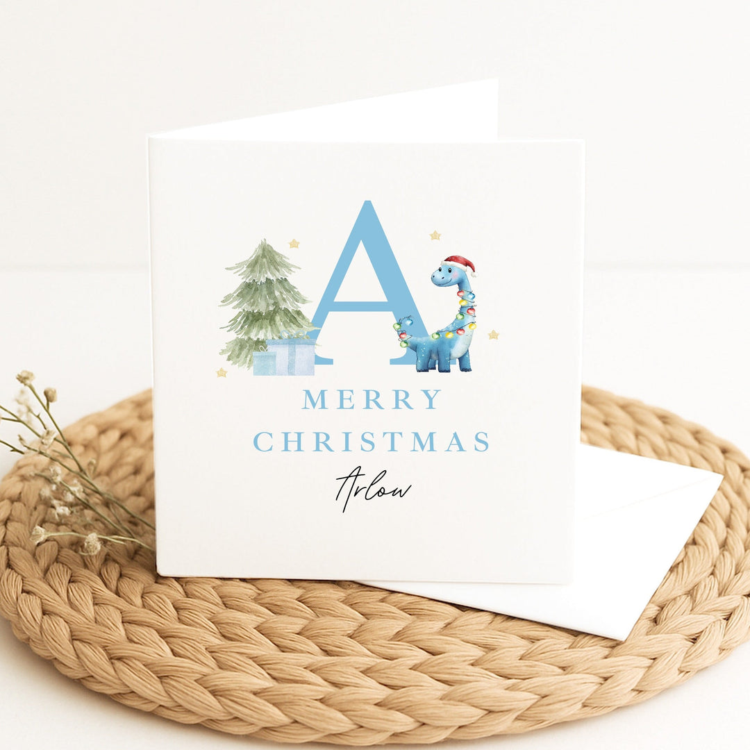 Personalised Blue Dinosaur Initial Merry Christmas Card