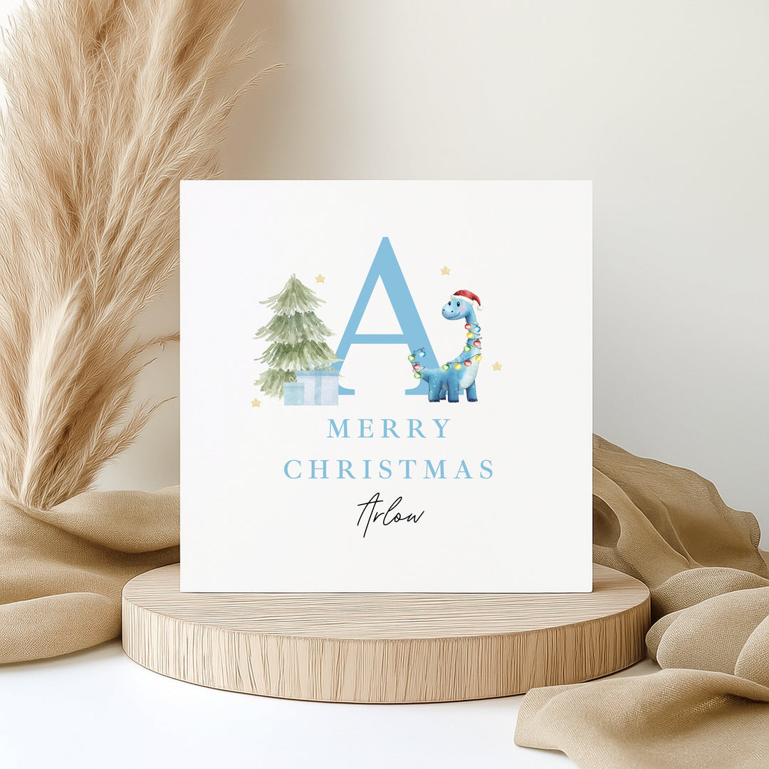 Personalised Blue Dinosaur Initial Merry Christmas Card