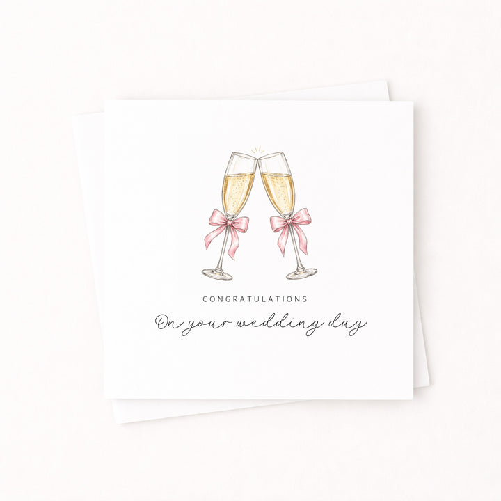 Pink Champagne Flutes Wedding Day Card