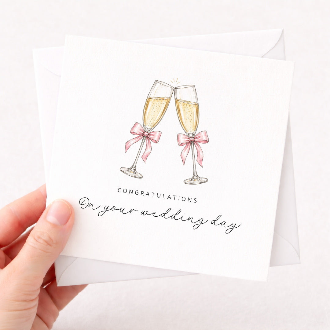 Pink Champagne Flutes Wedding Day Card