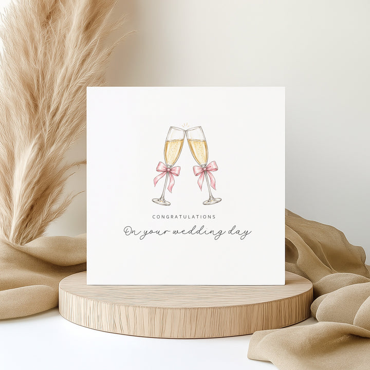 Pink Champagne Flutes Wedding Day Card
