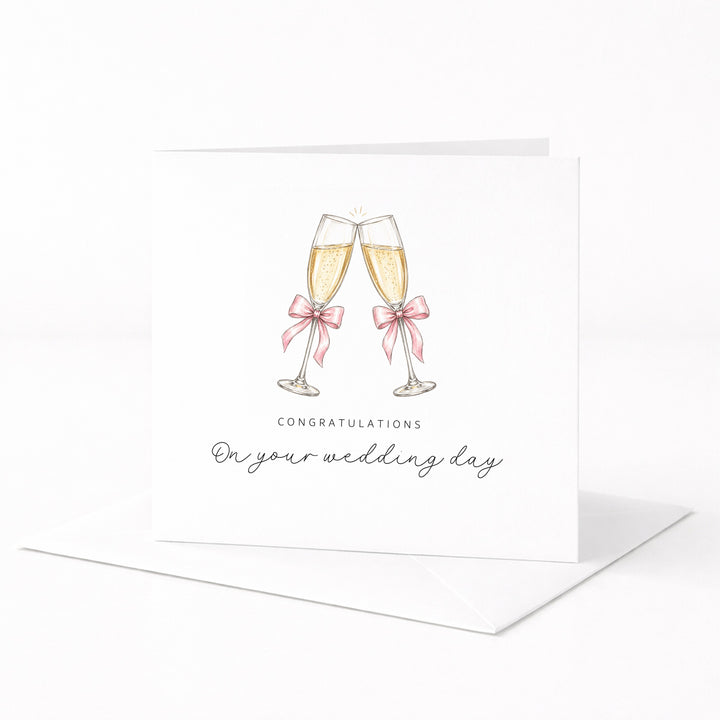 Pink Champagne Flutes Wedding Day Card